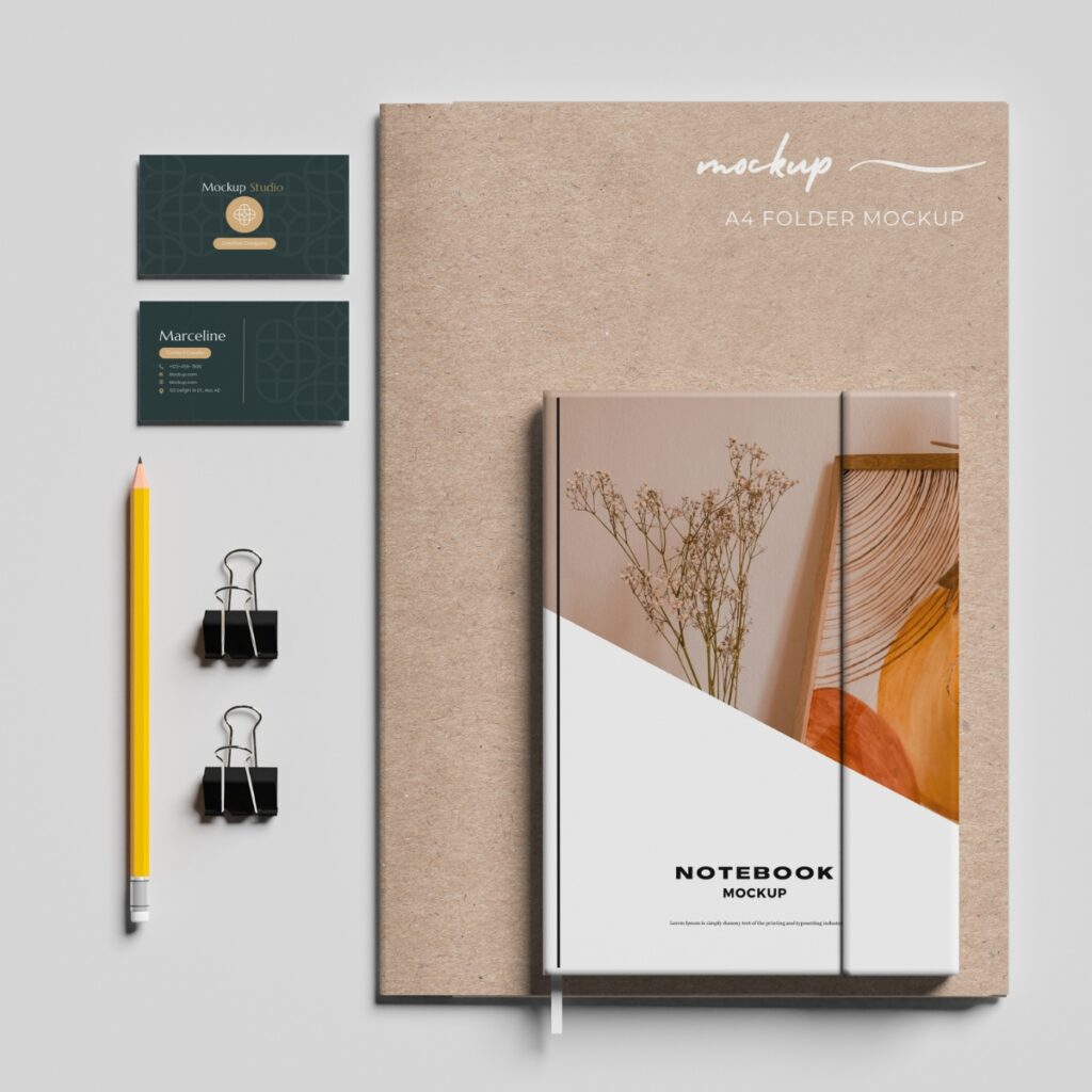 Blog branding kit mockups of a notebook, folder, and business cards.